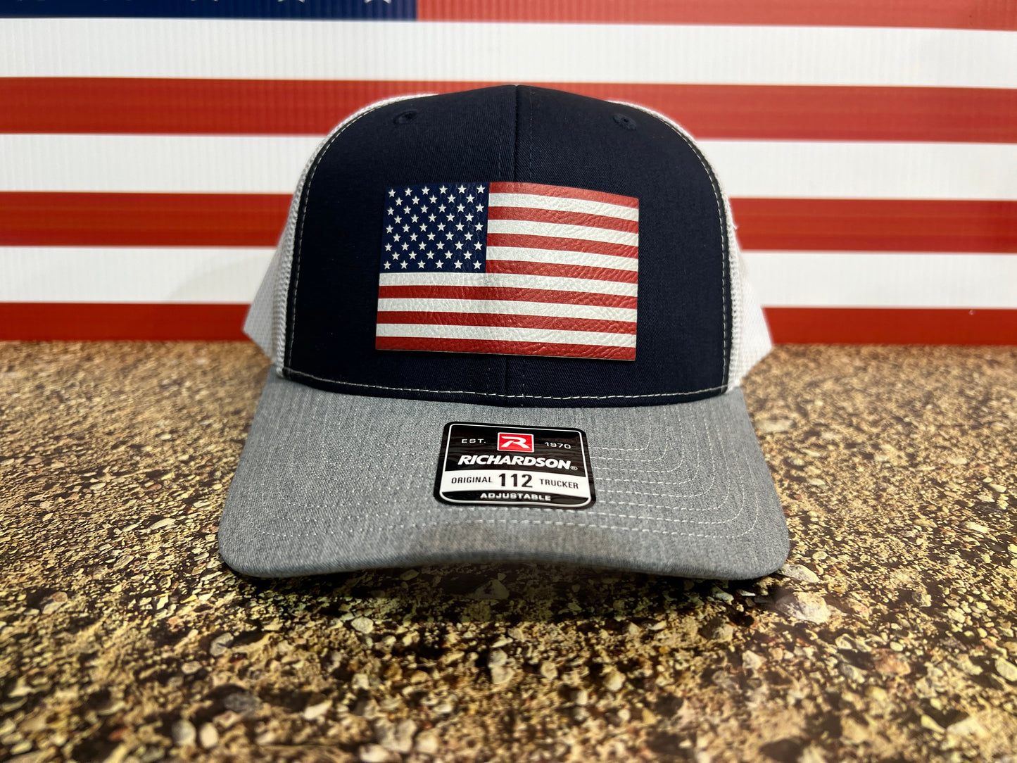 American Flag Hat UV Printed Premium Leatherette Patch on a Richardson 112 Trucker Hat.