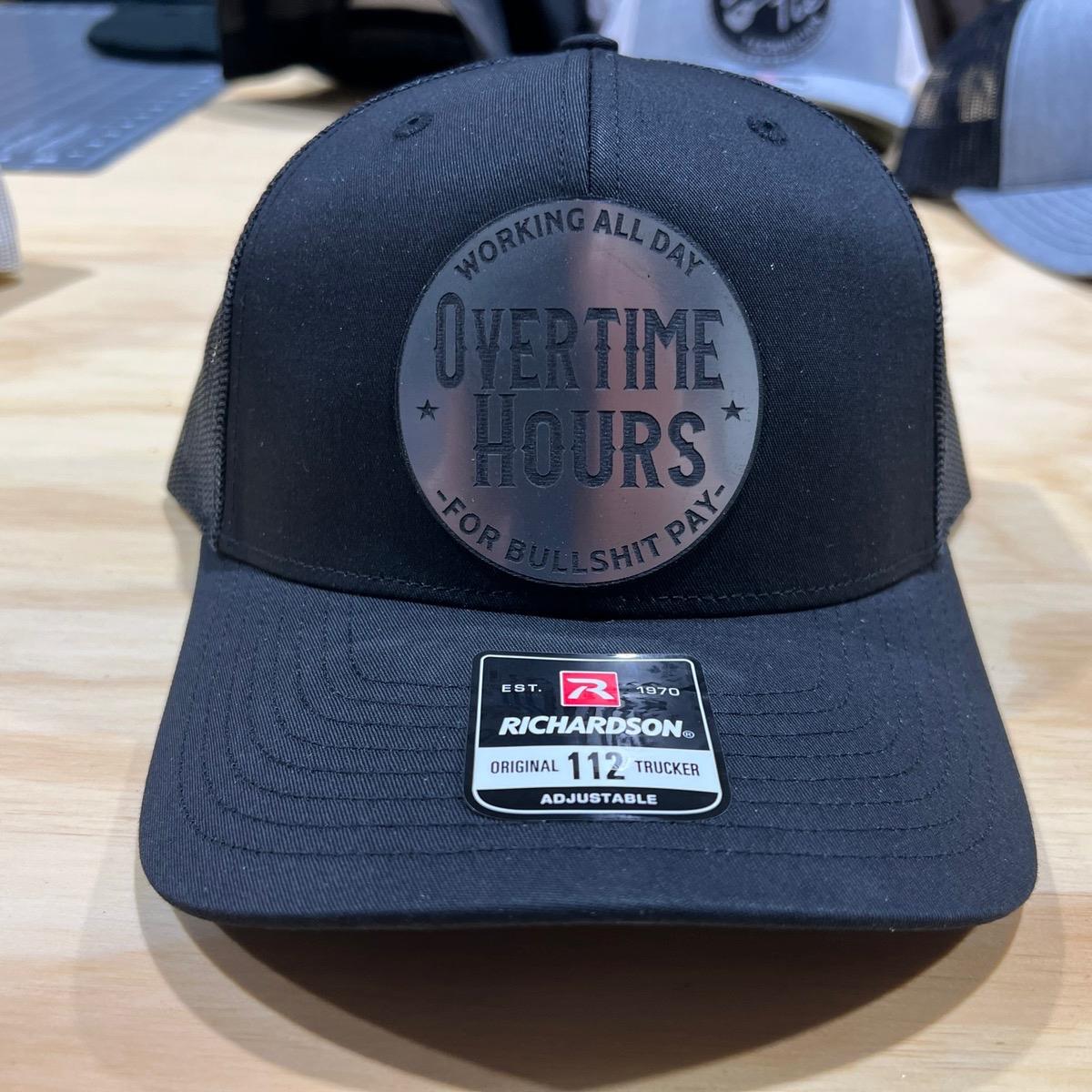 Overtime Hours Hat with Premium Patch on a Richardson 112 Trucker Hat