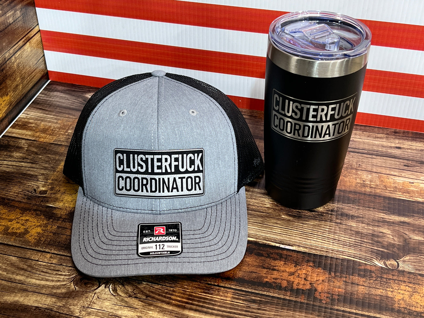 Clusterf*ck Coordinator Hat & Tumbler Combo Premium Leatherette Engraved Patch on a Richardson 112 Trucker Hat & 20 oz Polar Camel Tumbler