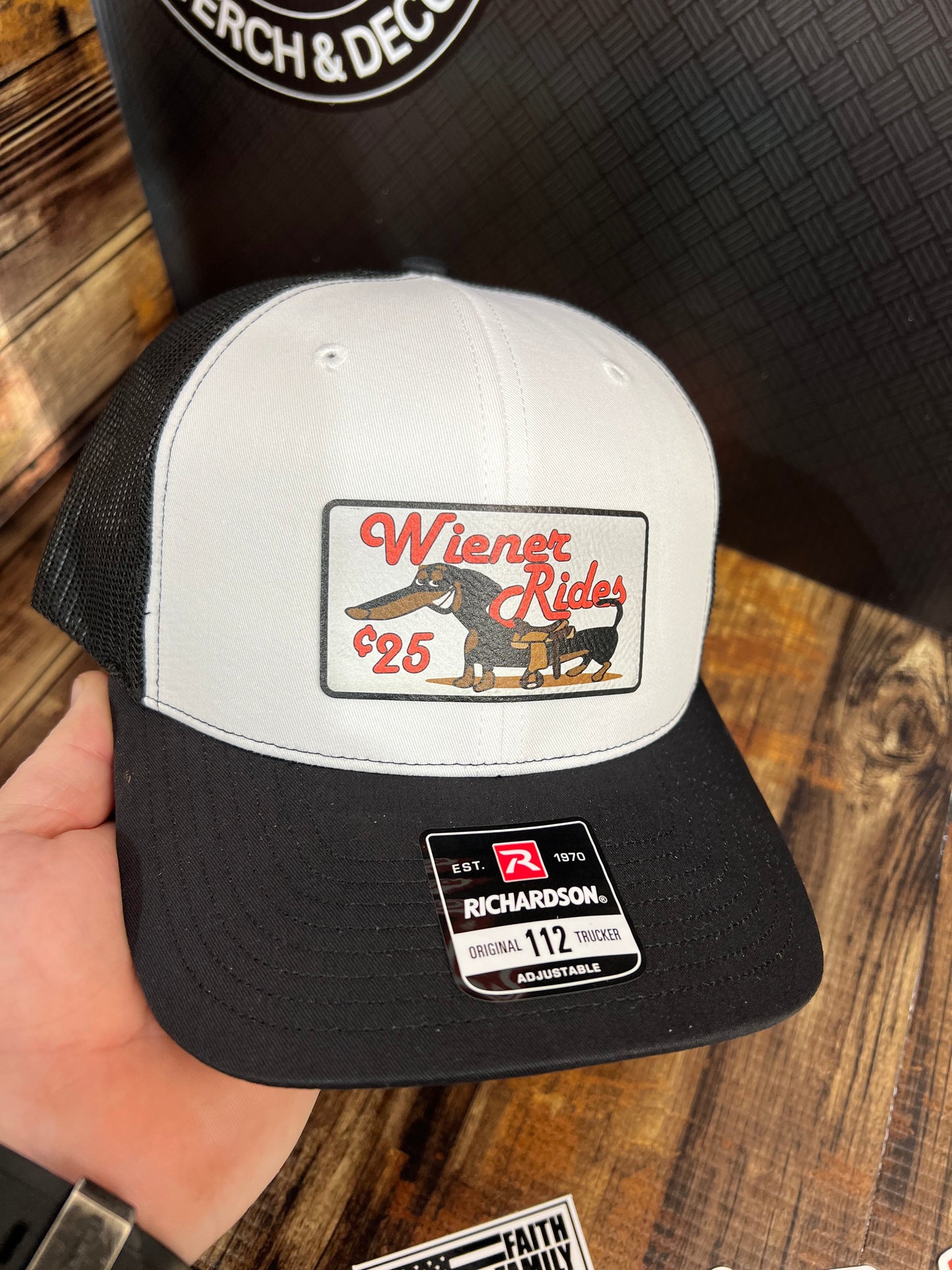 Wiener Rides Patch Hat with a UV Printed Premium Leatherette Patch on a Richardson 112 Trucker Hat