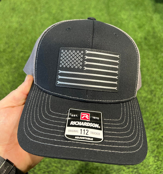 Mechanics Wrench Flag Hat Engraved Leatherette on a Richardson 112 Trucker Hat.